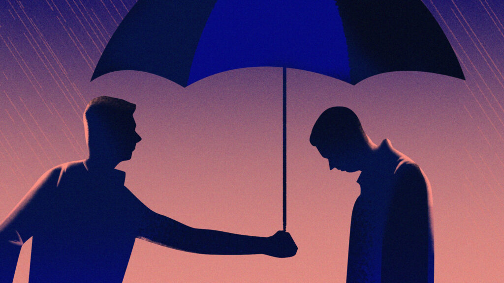 Deux homme sous la pluie, l'un tendant son parapluie à l'autre illustrant la prévention du suicide.